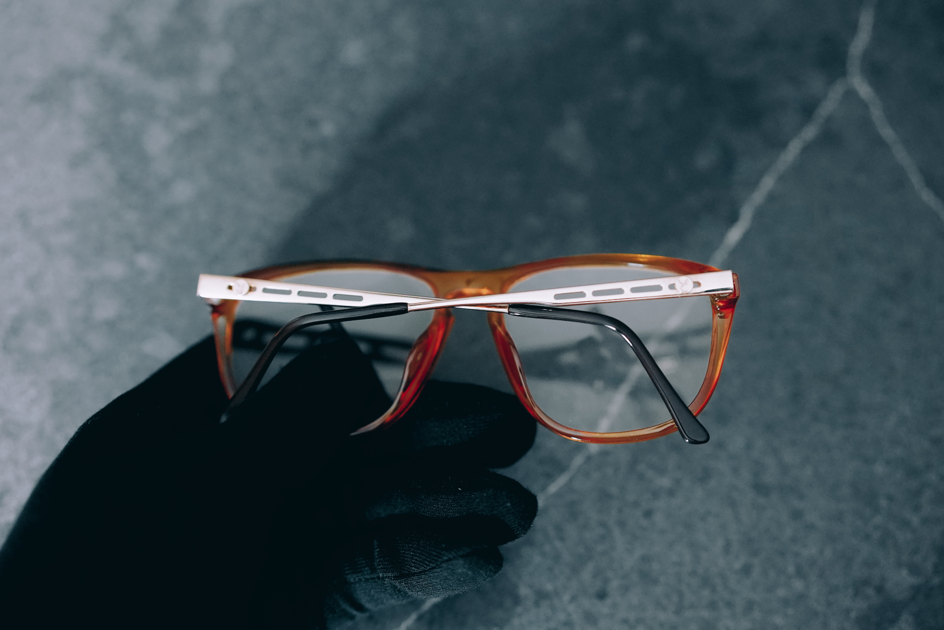 Playboy Honey Sport — three-quarter view showing perforated temples